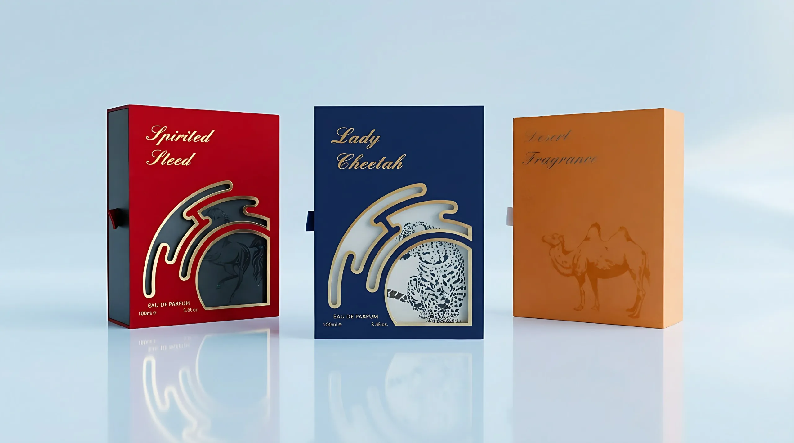 Red, navy and orange perfume gift boxes with animal-inspired graphics